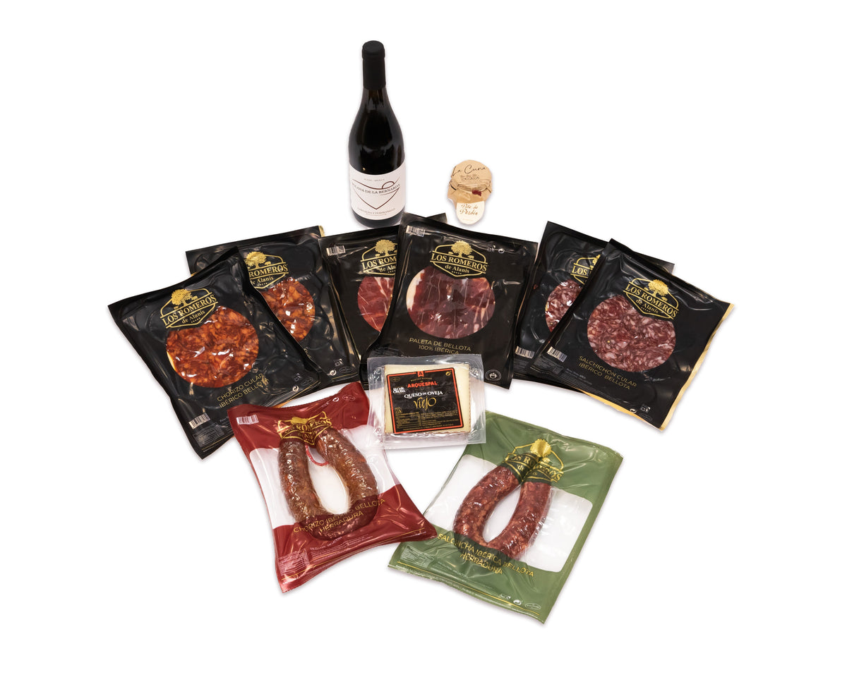 Lote de Navidad A mesa puesta de Los Romeros de Alanís: sobres de paleta y embutido de bellota, queso, paté y tinto