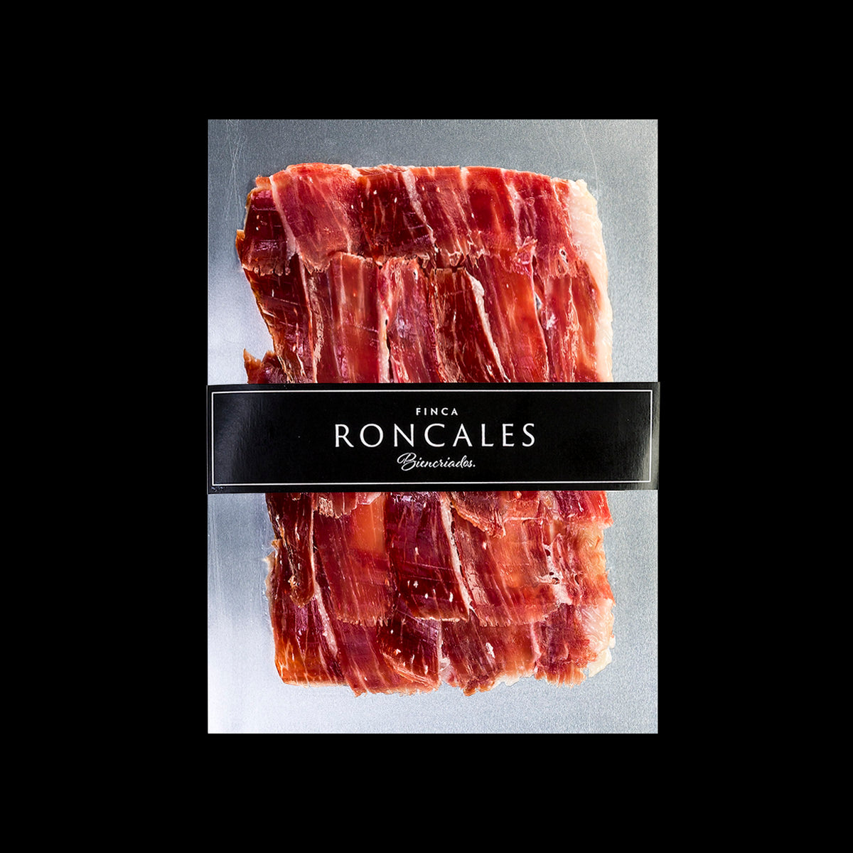 Sobre de 100 g de jamón de cebo de campo ibérico 50 % raza ibérica de Finca Roncales loncheado a cuchillo